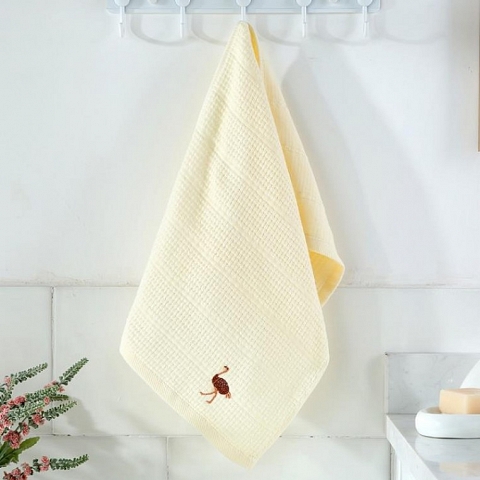   Solid color embroidered face towel