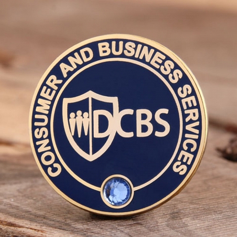 DCBS custom enamel pins